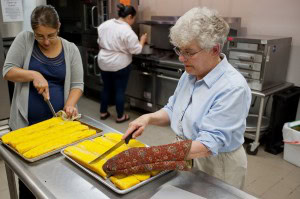 volunteers preparing food