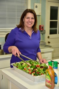 woman preparing salad