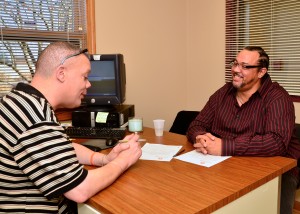 Case Manager Tim meets with a program participant.