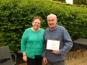 Carol Simler, DuPagePads President & CEO & Bob & Brown, DuPagePads Volunteer of the Year.