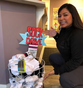 a woman with the sock drive