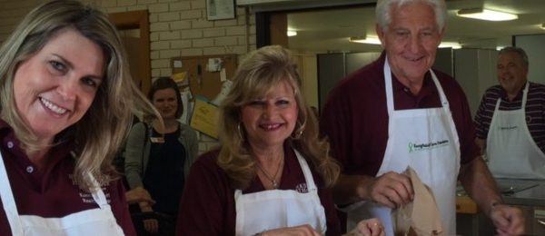 volunteers preparing food